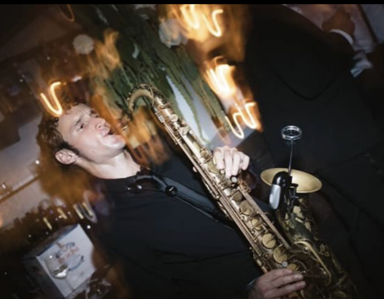 stylistically blurred photo of musician playing saxophone